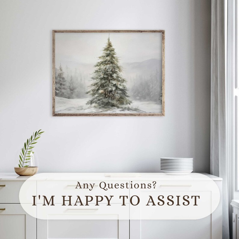 May include: A framed winter landscape painting depicting a snow-covered fir tree in a snowy forest. The artwork has a rustic wooden frame and a muted colour palette of whites, greys, and greens. The text "Any Questions? I'M HAPPY TO ASSIST" is at the bottom.