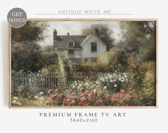 May include: A painting of a white house with a garden in the front. The garden is filled with pink and white flowers. The house has a white picket fence around it. The painting is in a rustic wooden frame.