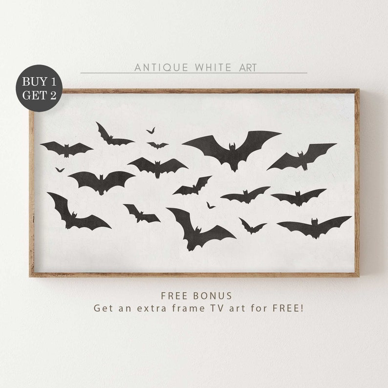 May include: A black and white printable art print featuring a silhouette of bats flying in a white background. The print has a rustic wood frame and the text "Antique White Art" and "FREE BONUS Get an extra frame TV art for FREE!" is printed below the image.