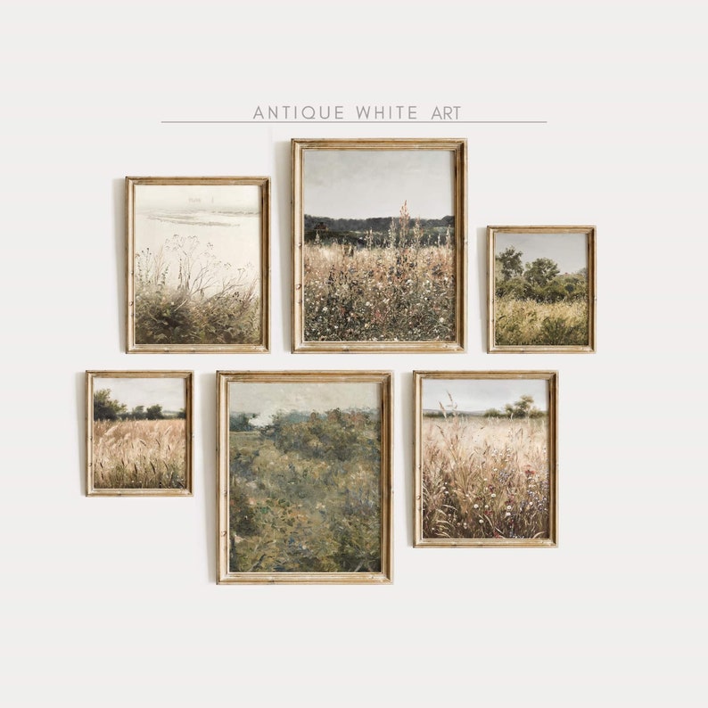 May include: A set of five framed landscape paintings with a rustic, vintage aesthetic. The paintings depict various scenes of fields and meadows with tall grasses and wildflowers. The frames are a light wood colour with a distressed finish.