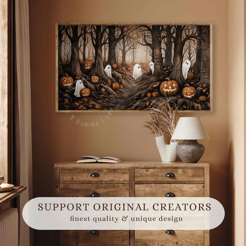 May include: A framed Halloween-themed print depicts a spooky forest scene with carved pumpkins, ghosts, and bare trees. The artwork has a vintage style, with a dark color palette. The text "SUPPORT ORIGINAL CREATORS" is at the bottom.