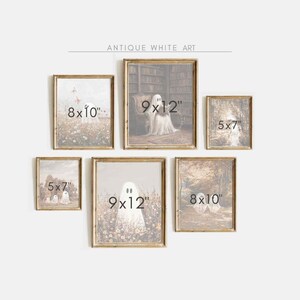 May include: A collection of five framed prints with a spooky theme. The prints feature ghosts, trees, and a library. The frames are all antique white and have a distressed look. The prints are all different sizes, with the largest being 9x12 inches and the smallest being 5x7 inches.