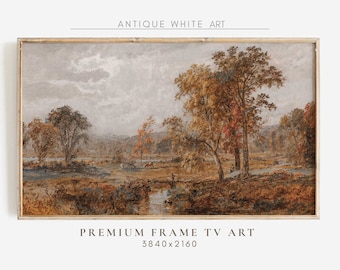 Könnte beinhalten: Gerahmtes antikes Landschaftsgemälde. Das Kunstwerk zeigt eine ruhige Szene mit Bäumen in Herbstfarben, einem kleinen Bach und einem bewölkten Himmel. Die Texte "ANTIQUE WHITE ART" und "PREMIUM FRAME TV ART" sind sichtbar.