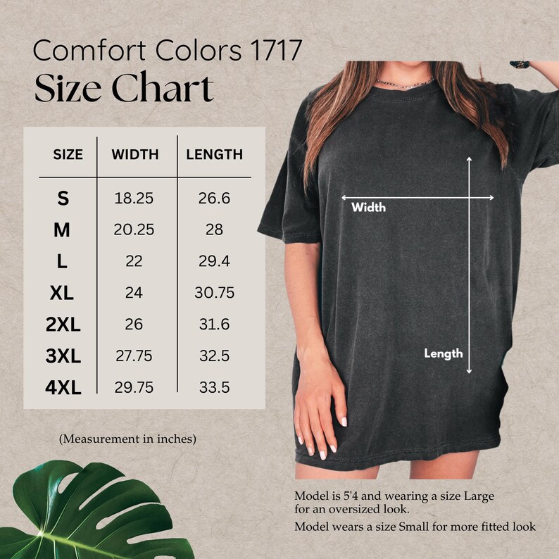Peut inclure: Tableau des tailles pour un t-shirt avec des mesures en pouces pour les tailles S &agrave; 4XL. Le tableau indique la largeur et la longueur du t-shirt en pouces. Le mannequin porte un t-shirt taille L.