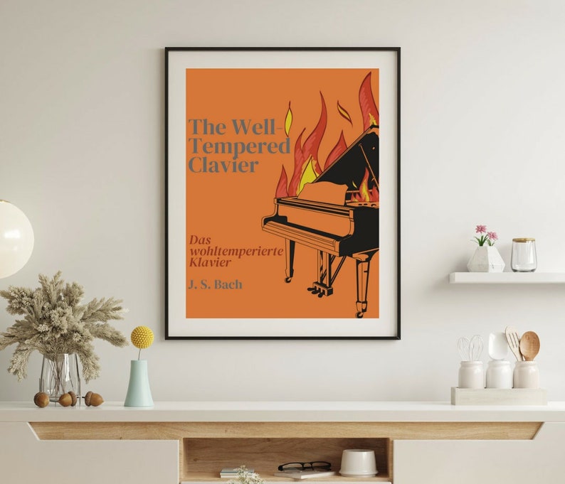 May include: A framed poster with an orange background and a black and white grand piano engulfed in flames. The text on the poster reads "The Well-Tempered Clavier" and "Das wohltemperierte Klavier J.S. Bach".