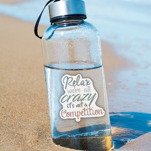 Relax! We’re All Crazy, It’s Not a Competition | Waterproof Sticker Decal | Premium Waterbottle Sticker | Laptop Sticker | Car Window Decal
