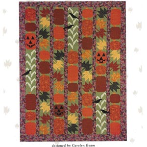 May include: A colorful fall-themed quilt with the text "Fall Row Quilt." The quilt features rows of orange, brown, and yellow squares, with leaf and jack-o'-lantern designs. Black crows and a green chevron pattern are also included.