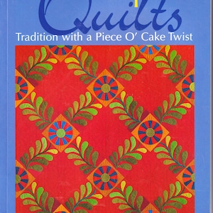 May include: A white ceramic mug with a black handle and the text "But First, Coffee" in a black, handwritten-style font. The mug is on a white surface.