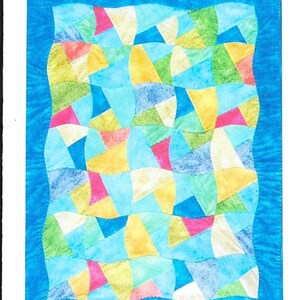 May include: A colorful quilt with a blue border. The quilt features a patchwork design of various shapes in shades of blue, yellow, green, pink, and white. The quilt has a wavy edge and is likely handmade.