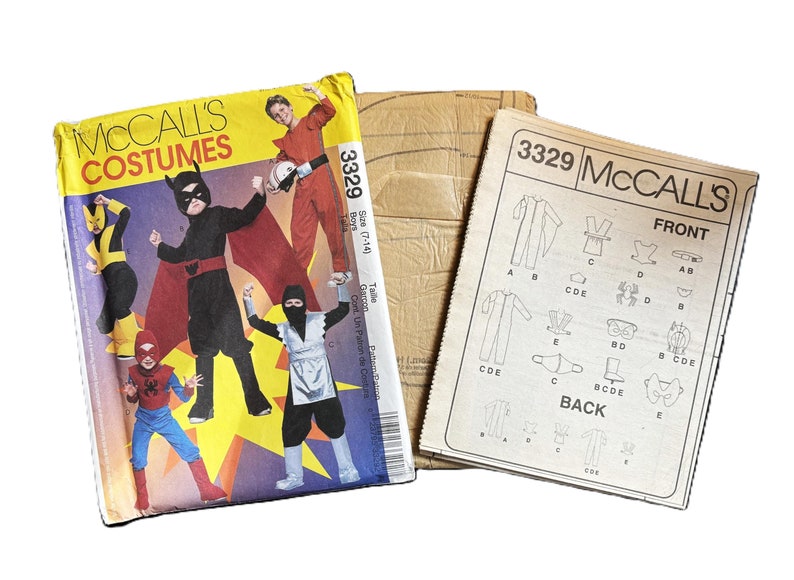 May include: A sewing pattern for children's costumes. The pattern includes instructions for making a ninja, a superhero, and a spider-man costume. The pattern is for sizes 7-14. The pattern is from McCall's Costumes.