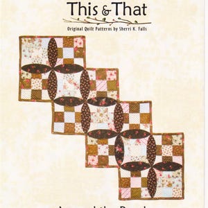 May include: A quilt pattern titled "Around the Bend" by Sherri K. Falls. The design features four stacked quilt blocks with floral and geometric patterns in brown, pink, and cream colors. The text "Little Scraps from This & That" is at the top.