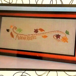 変化の風 秋のざわめき W-102 | クロスステッチパターン | 幅163×高さ38ステッチ | Stitchopolis | 壁掛け | 葉っぱ、秋の飾り