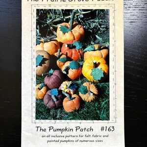 May include: A craft pattern for making felt, fabric, and painted pumpkins. The pattern is called "The Pumpkin Patch #163" and includes instructions for making pumpkins of various sizes.