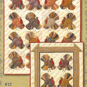 May include: A quilted wall hanging featuring turkey designs. The turkeys have colorful, patterned tail feathers and red wattles. The background is a cream color with a diamond pattern. The text "#12 TURKEY TIME" is visible.