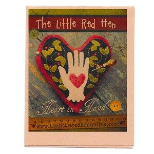 May include: A craft kit titled "The Little Red Hen" featuring a heart-shaped design with a hand and heart graphic. The design includes a ruler, buttons, and the website address www.thelittleredhenonline.com.