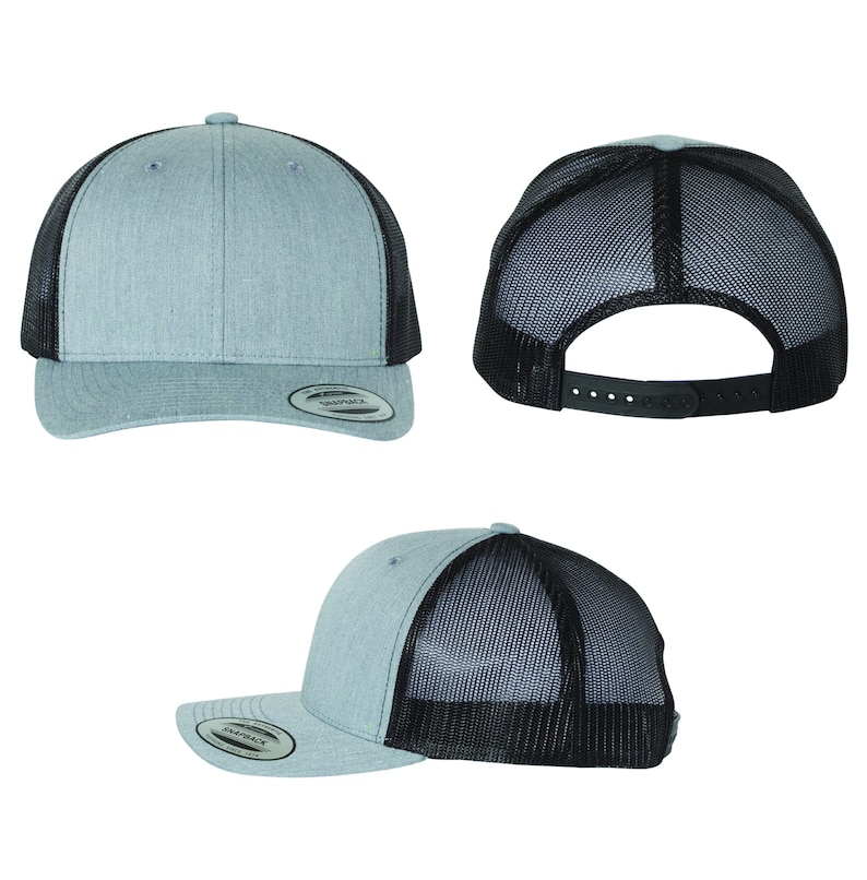 May include: A gray and black trucker hat with a mesh back. The hat has a curved brim and a snap closure.