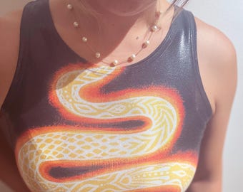 The Year of the Snake. Glittery crop top.