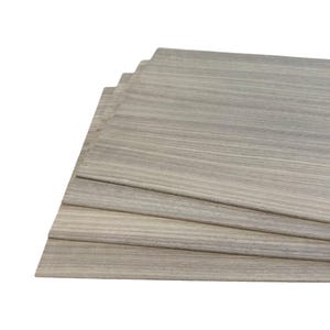 May include: Stack of four light gray wood panels with a wood grain pattern.