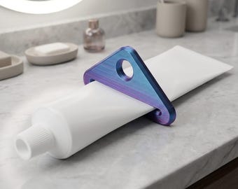 Dispensador de pasta de dientes impreso en 3D | Enrollador de tubo | Gadget de baño sin residuos | Organizador de baño familiar | Regalo ecológico práctico | Llave de pasta de dientes
