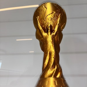 Handmade PLA gold trophy base with smooth 3D printed finish – eco-friendly World Cup collectible