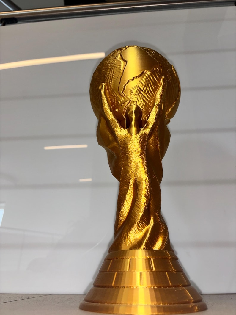 Handmade PLA gold trophy base with smooth 3D printed finish – eco-friendly World Cup collectible