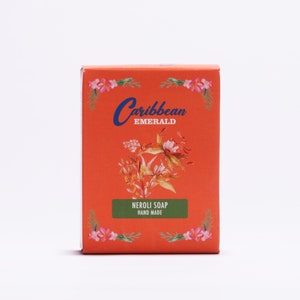 May include: Orange box with a floral design and the text "Caribbean Emerald" and "Neroli Soap Hand Made".