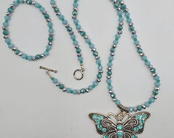 Crystal Butterfly Pendant Necklace Toggle Clasp and Elastic Stretchy Bracelet: Artisan Beaded