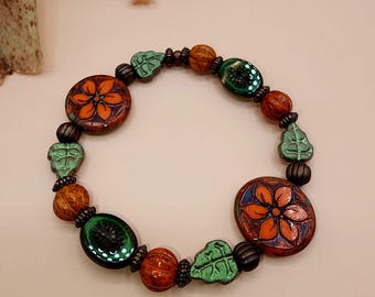 CB07 Czech Glass Handcrafted Artisan Beaded Bracelet Brown and Orange Floral Coin and Melons Picasso Finish Boho Style Green Leaves