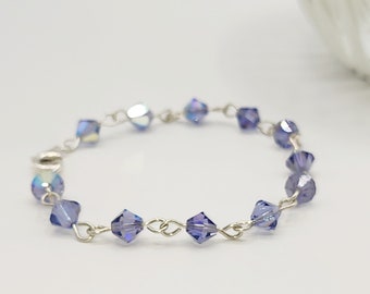 0102 7.5-in Swarovski Crystal Handcrafted Artisan Bracelet Tanzanite AB Color 6mm Bicones Solid Sterling Silver Clasp, Loops and Ring