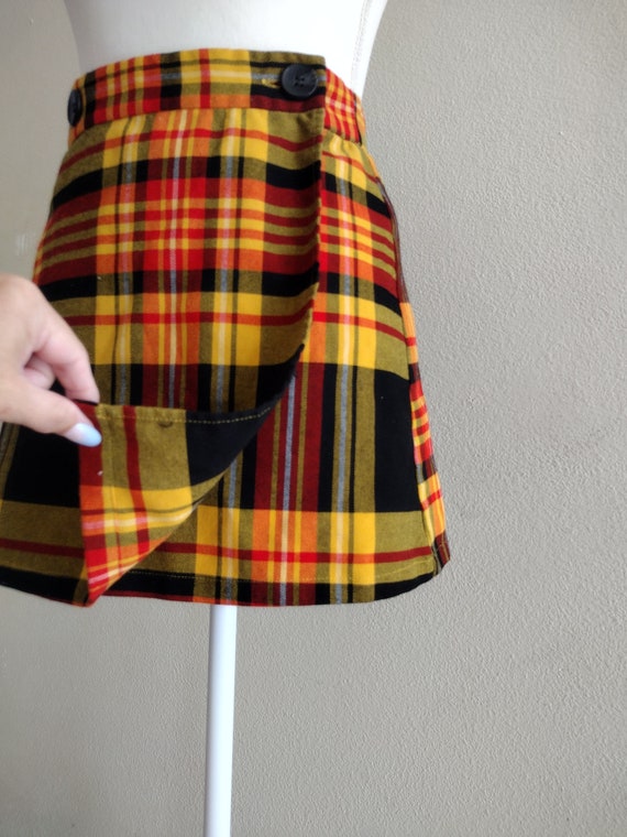 1990s wrap skirt in plaid with button enclosure