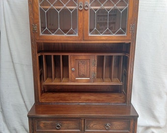 Old Charm Cabinet With Double Doors And Open Shelving Unit To Top