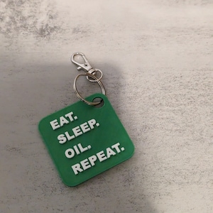 eat sleep oil repeat key chain