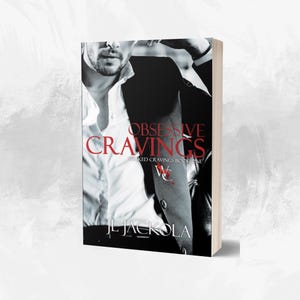 May include: A book cover with a black and white photo of a man in a suit. The title of the book is "Obsessive Cravings" and the subtitle is "Wicked Cravings Book One". The author's name is "JL Jackola".