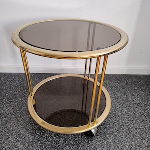 1 of 2 Mid Century Brass  Smoked Glass Serving Trolley/ Hollywood Regency Bar Cart/ Vintage Rolling Bar/ Serving Cart/ Gold Coctail Trolley