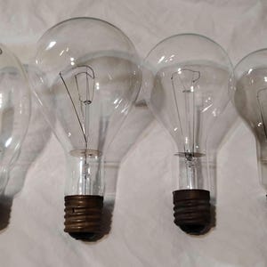 Vintage light bulbs lot of 4 GE 300watt light bulbs and Mazda