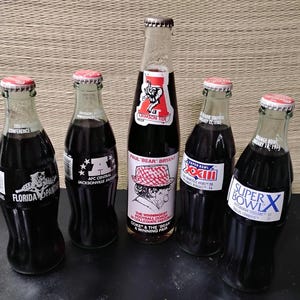 Vintage Coca-Cola bottle lot football coke bottles
