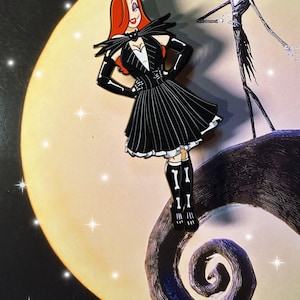 May include: A metal enamel pin featuring a character with long red hair wearing a black and white pinstriped dress, black gloves, and bone-patterned socks, standing next to a tall, thin, skeletal figure on a dark, spiraling hill against a large moon.