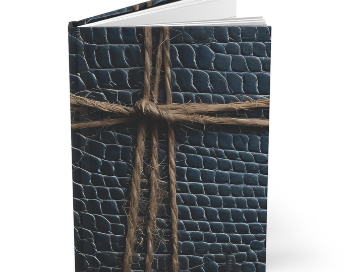 Vintage inspired journal. The contrasting leather with the rope is inspiring. The rope reminds me of a cross. Enjoy!
