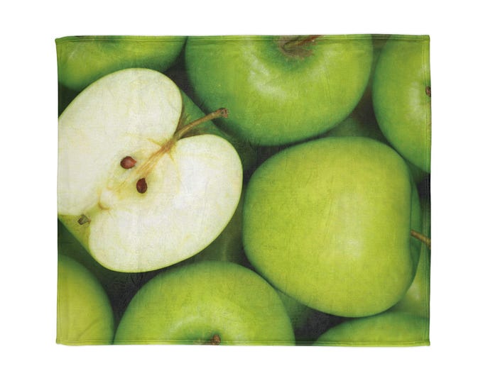 Cozy up to a green apple plush throw blanket. Perfect for fall. Enjoy!