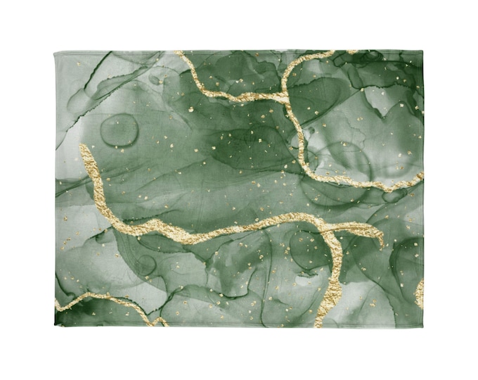 Green marble. Green is both comforting and bold at the same time. Add some stripes of gold. Simply beautiful. Enjoy!