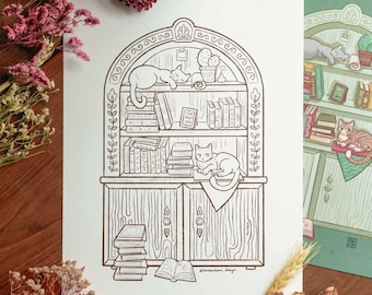 May include: Two art prints featuring illustrations of cats and bookshelves. One print is a black and white line drawing, the other is a green print with color. The illustrations depict cats lounging on and around the bookshelves.