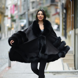 Cape fur coat top
