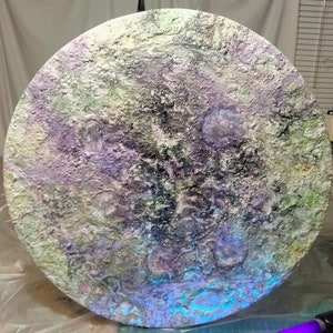 Psychedelic glowing moon painting