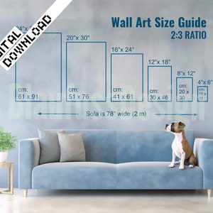 May include: A wall art size guide with a sofa in the foreground. The guide shows different sizes of wall art in inches and centimeters, with a 2:3 ratio. The sofa is 78 inches wide.