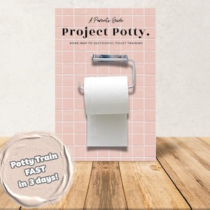May include: A book titled "Project Potty" with the subtitle "Road Map to Successful Toilet Training" is displayed against a pink tiled wall. A roll of white toilet paper hangs below a chrome toilet paper holder. The text "Potty Train FAST in 3 days!" is in a circle.