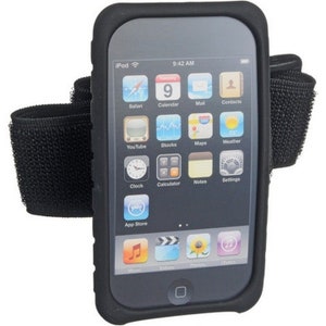 May include: Black armband with a velcro closure for an iPod touch. The armband has a clear plastic case to protect the device. The iPod touch screen shows the time, 9:42 AM, and several app icons.