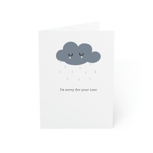 May include: A grey cloud with a sad face is crying raindrops. The text "I'm sorry for your loss" is below the cloud.