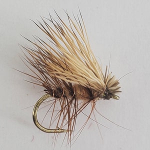 Tan Elk Hair Caddis 12 Flies Per Order. They Come in Sizes 14, 16, 18, 20, and 22