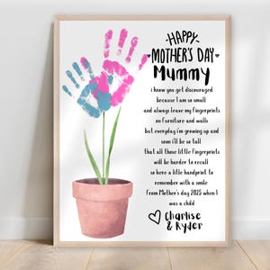 May include: A printable Mother's Day card with a handprint flower design. The card features a poem that reads "Happy Mother's Day Mummy, I know you get discouraged because I am so small and always leave my fingerprints on furniture and walls, but everyday I'm growing up and soon I'll be so tall that all those little fingerprints will be harder to recall, so here a little handprint to remember with a smile from Mother's Day 2025 when I was a child, Charlise & Ryder."