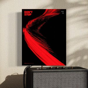 May include: A rectangular wall art print featuring a black background with a vibrant red abstract motion blur effect sweeping across the center. The text DON'T STOP is printed in red in the upper left corner. The print is labeled as 11x14 inches.